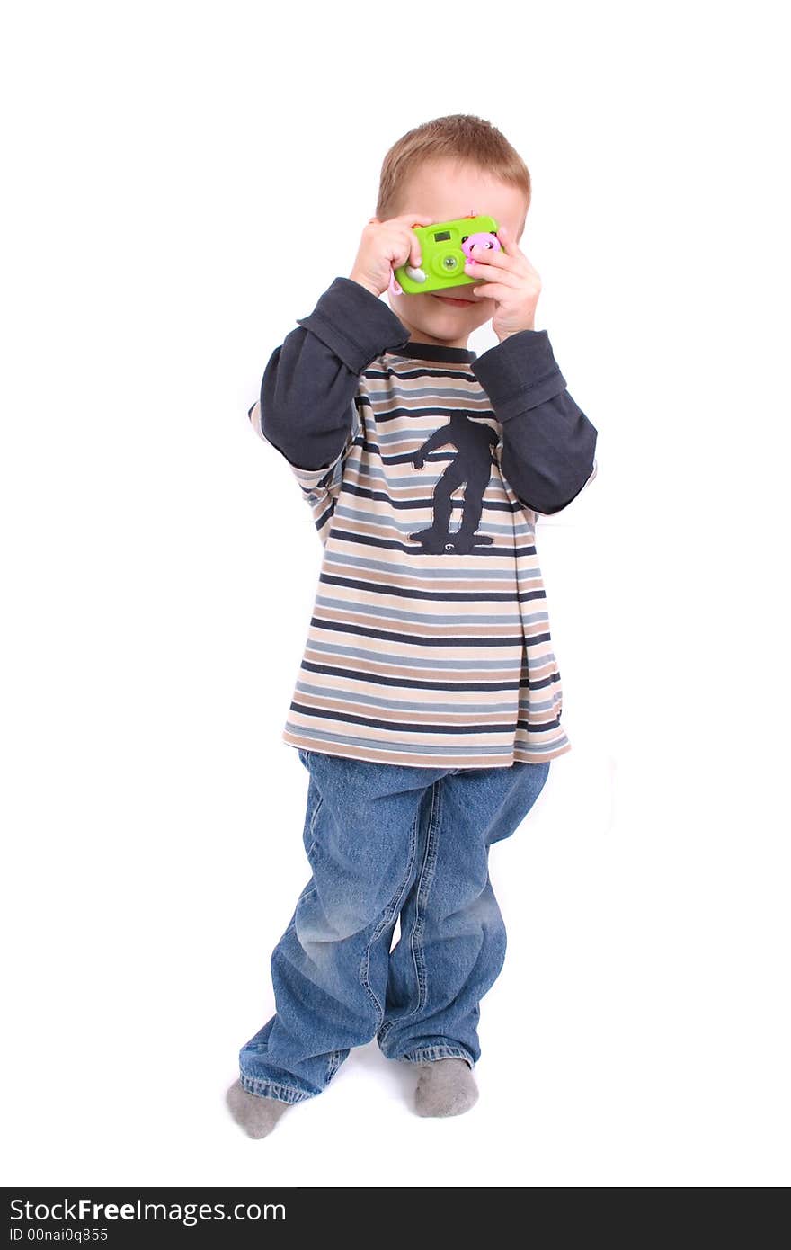 Young photographer and his toy on the white background