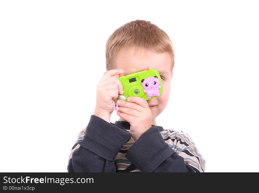 Young photographer and his toy on the white background