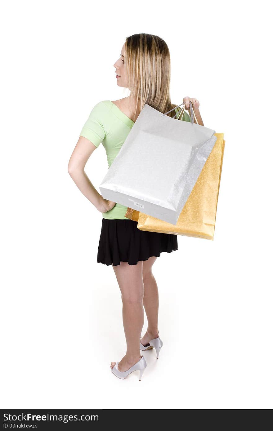 Woman with shopping bags over white background