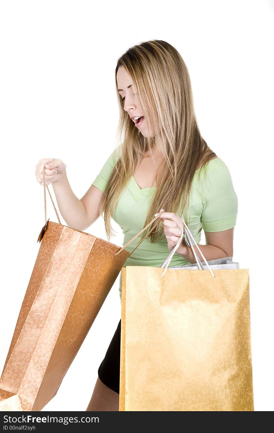 Woman with shopping bags over white background