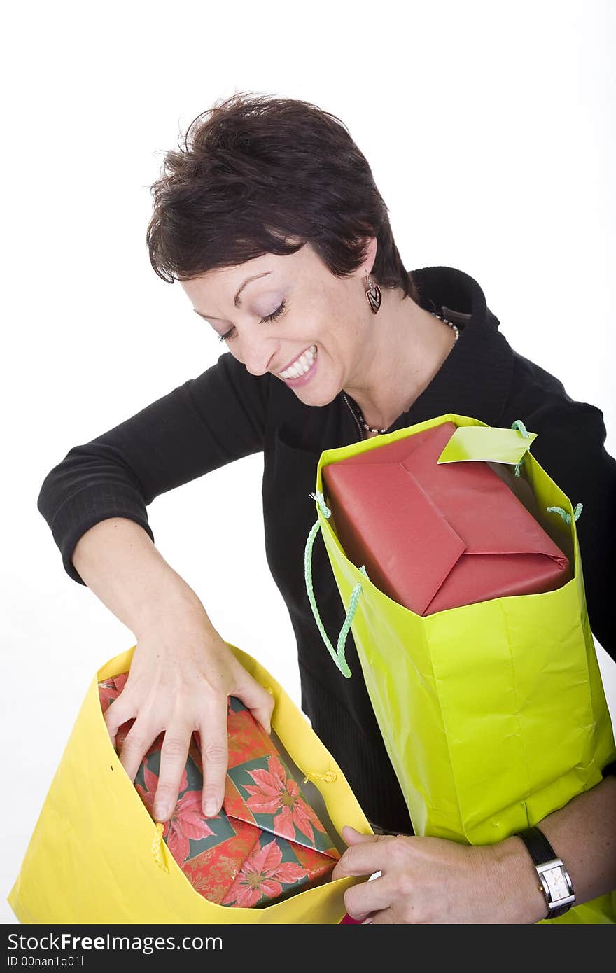 Woman with shopping bags over white background. Woman with shopping bags over white background