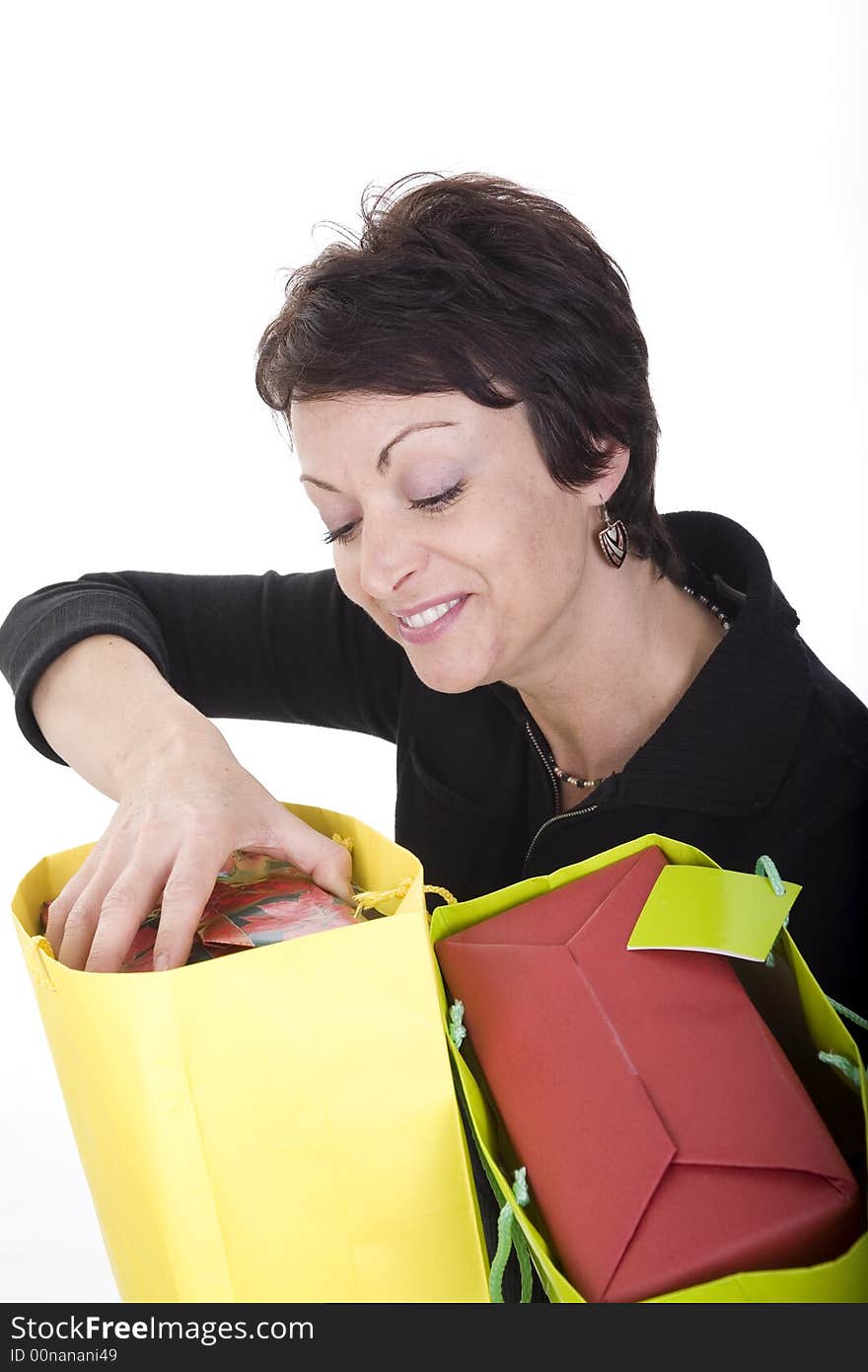 Woman with shopping bags over white background. Woman with shopping bags over white background