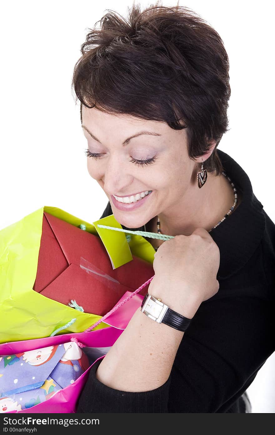 Woman with shopping bags over white background. Woman with shopping bags over white background