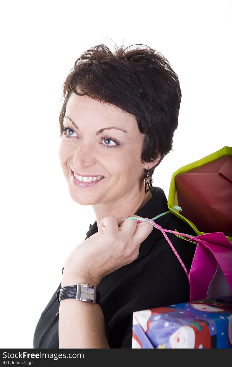 Woman with shopping bags over white background. Woman with shopping bags over white background