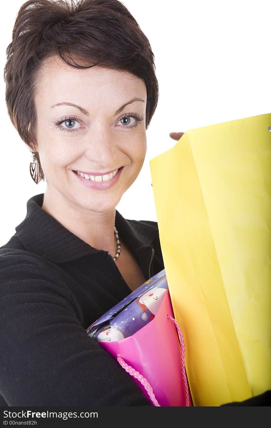 Woman with shopping bags over white background. Woman with shopping bags over white background