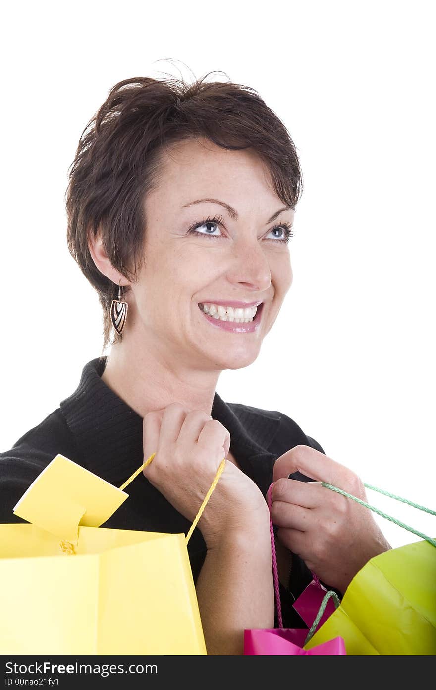 Woman with shopping bags over white background. Woman with shopping bags over white background