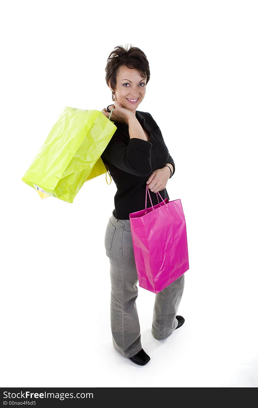 Woman with shopping bags over white background. Woman with shopping bags over white background