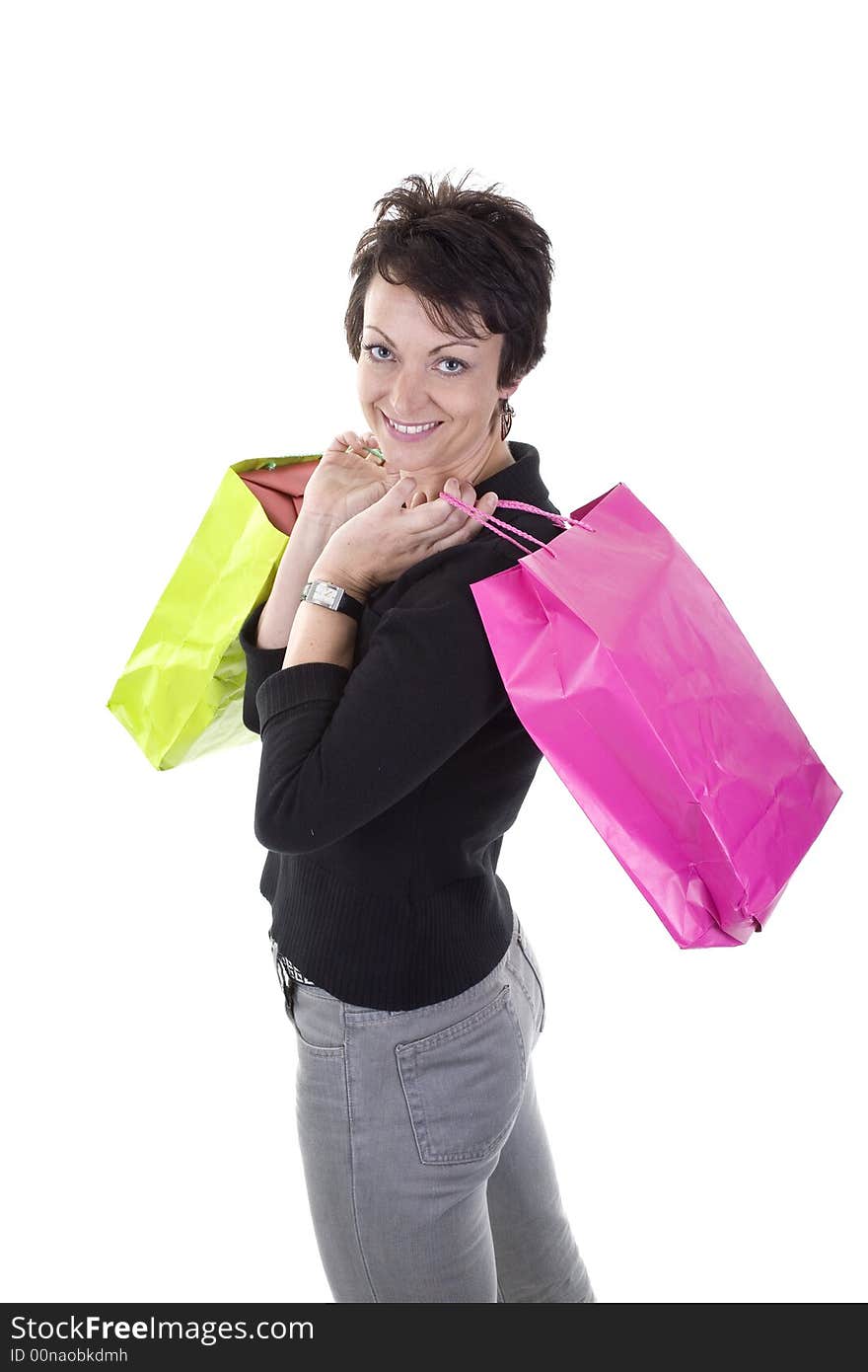 Woman with shopping bags over white background. Woman with shopping bags over white background