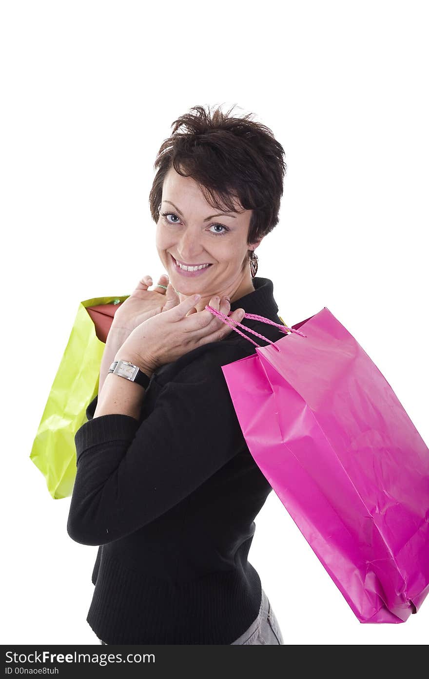 Woman with shopping bags over white background. Woman with shopping bags over white background