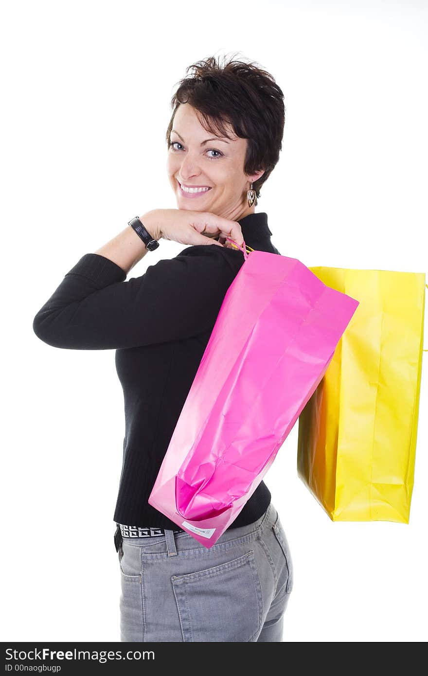 Woman with shopping bags over white background. Woman with shopping bags over white background