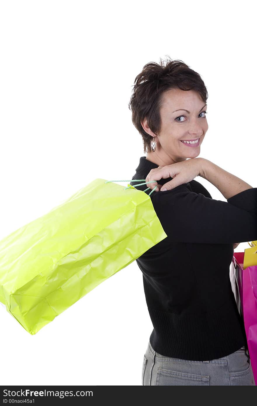 Woman with shopping bags over white background. Woman with shopping bags over white background