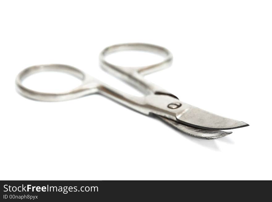 Manicure small scissors on a white background