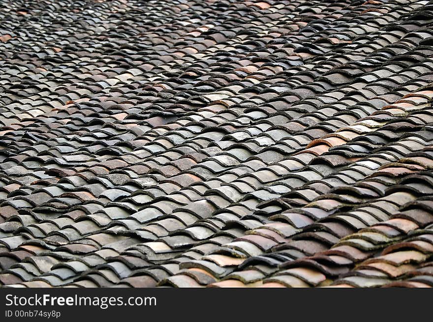 Abstract roof tile pattern, shot at an old village near Guilin, China. Abstract roof tile pattern, shot at an old village near Guilin, China.