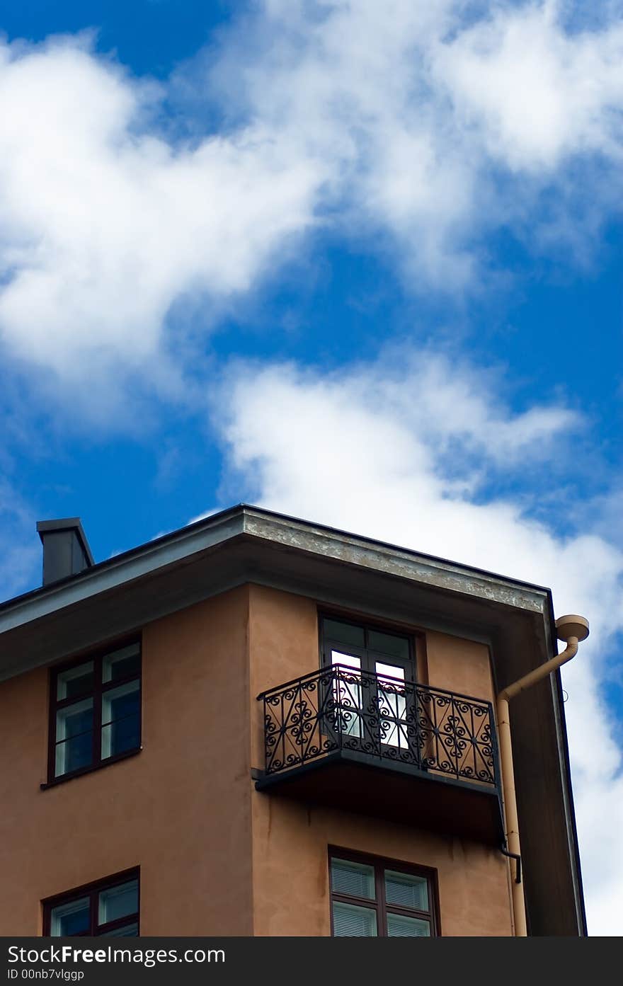 Block house with a balcony. Block house with a balcony