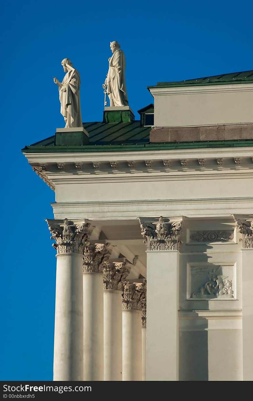 The white church of helsinki with statues