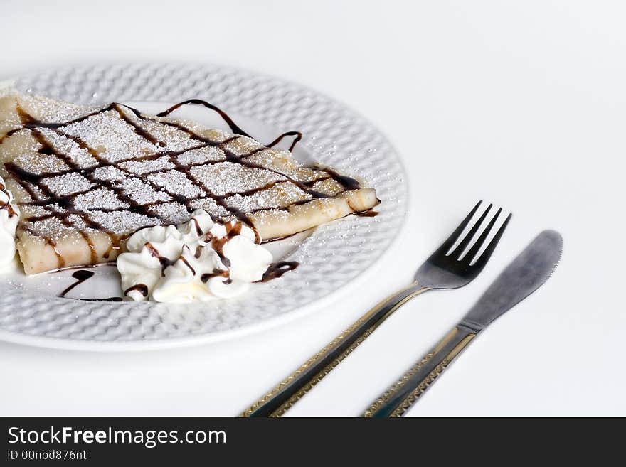 Pancake With Chocolate and cream on plate