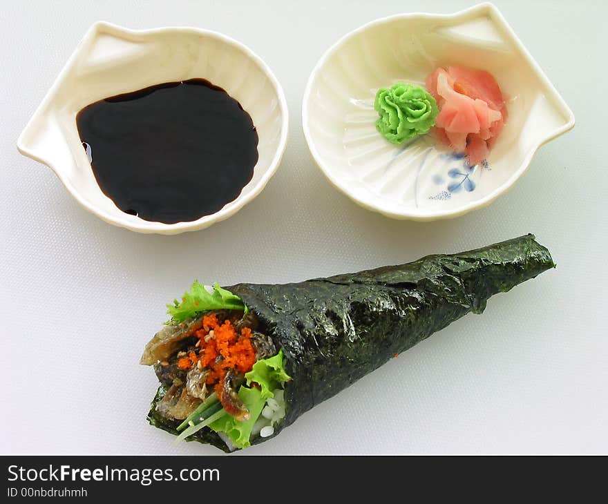 The torch of salmon skin do sushi in the shape of the white background