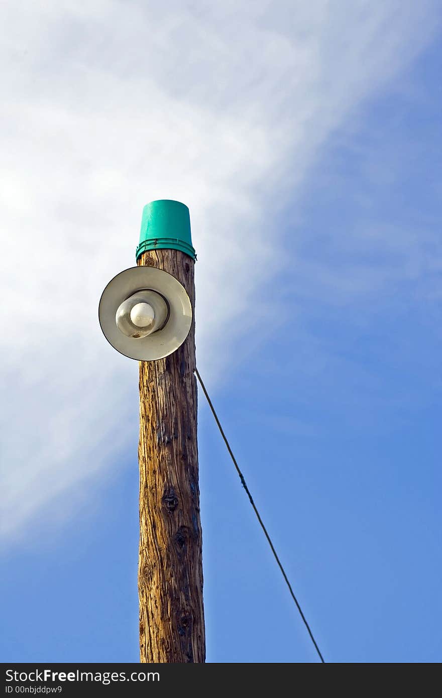 Electrical wooden column with lamp