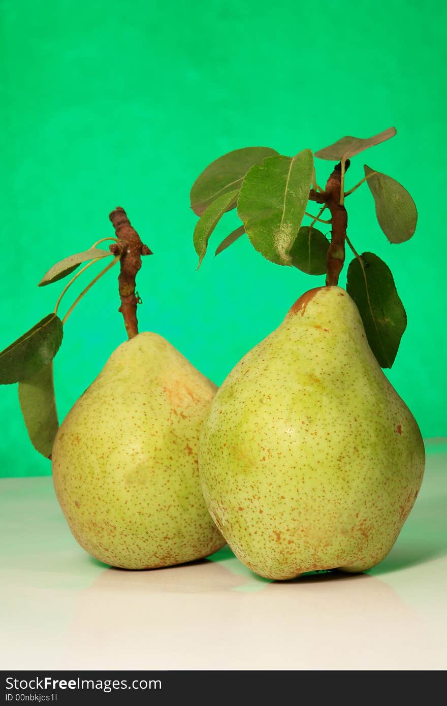 Pear on a green background