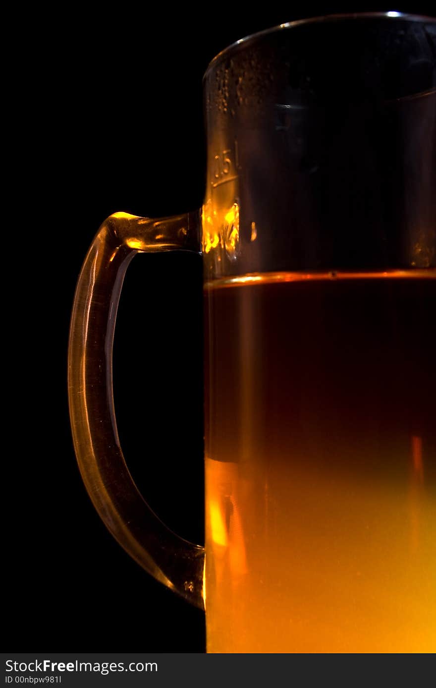 Cup of tea on black background