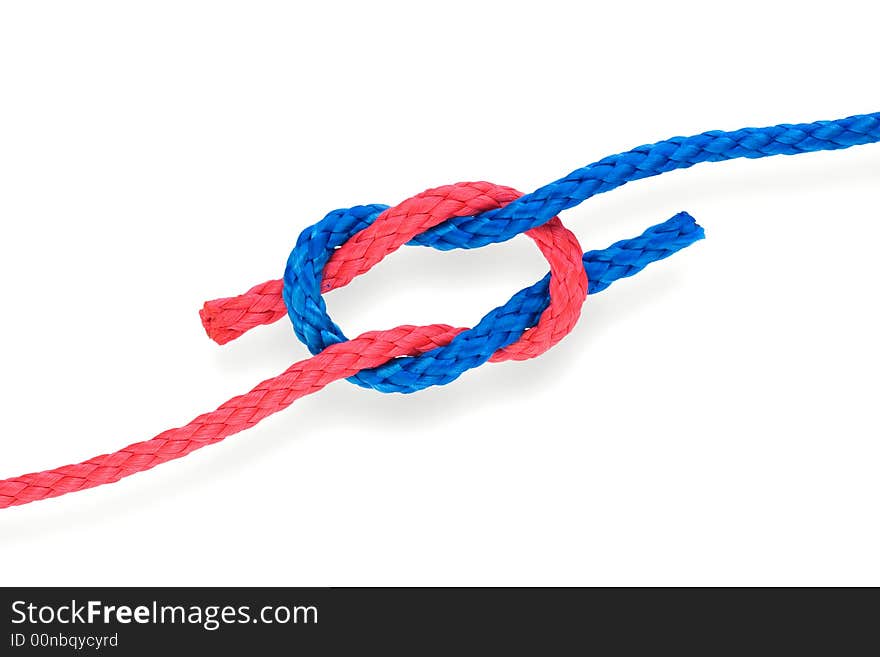 Fisher's bad reef knot with red and blue ropes. Isolated on white. Fisher's bad reef knot with red and blue ropes. Isolated on white.