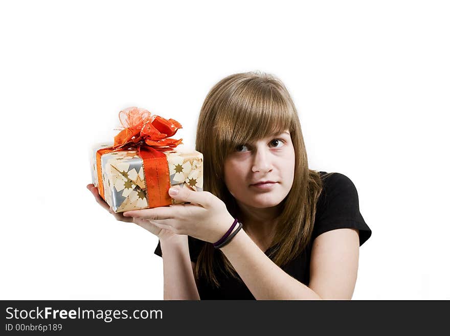 A teen girl with Christmas gifts in hands. A teen girl with Christmas gifts in hands