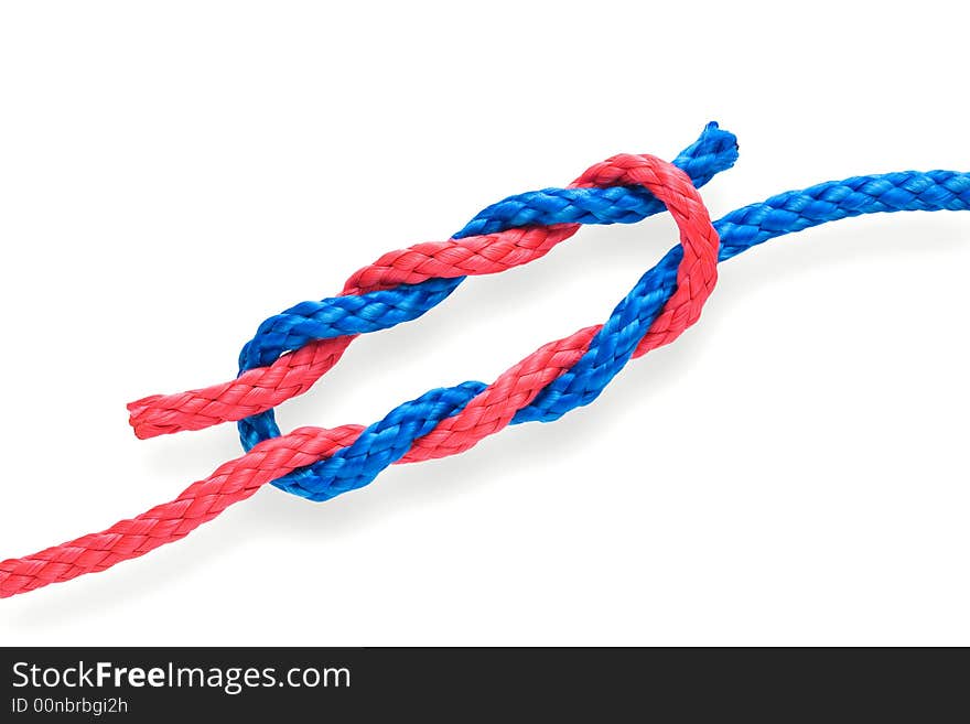 Fisher's academic knot with red and blue ropes. Isolated on white. Fisher's academic knot with red and blue ropes. Isolated on white.