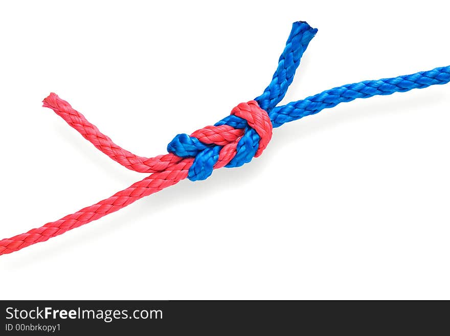 Fisher's academic knot with red and blue ropes. Isolated on white. Tight. Fisher's academic knot with red and blue ropes. Isolated on white. Tight.