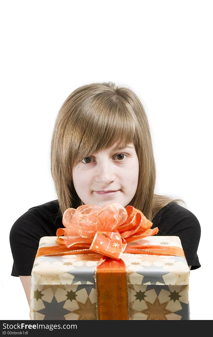 A teen girl with Christmas gifts in hands. A teen girl with Christmas gifts in hands