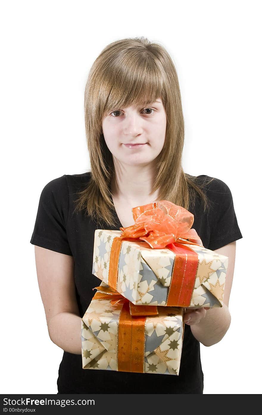 A teen girl with Christmas gifts in hands. A teen girl with Christmas gifts in hands