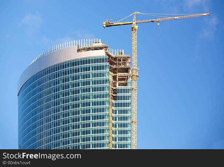 Construction of a skyscraper in Moscow, early morning. Construction of a skyscraper in Moscow, early morning