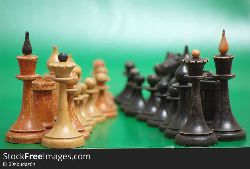 Chess order on green background