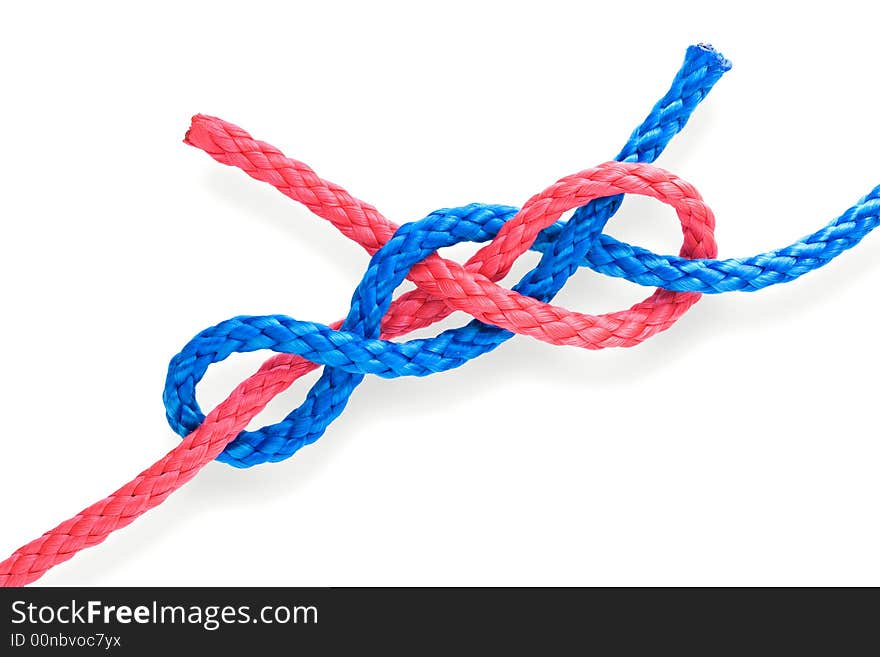 Fisher's dagger knot with red and blue ropes. Isolated on white. Fisher's dagger knot with red and blue ropes. Isolated on white.