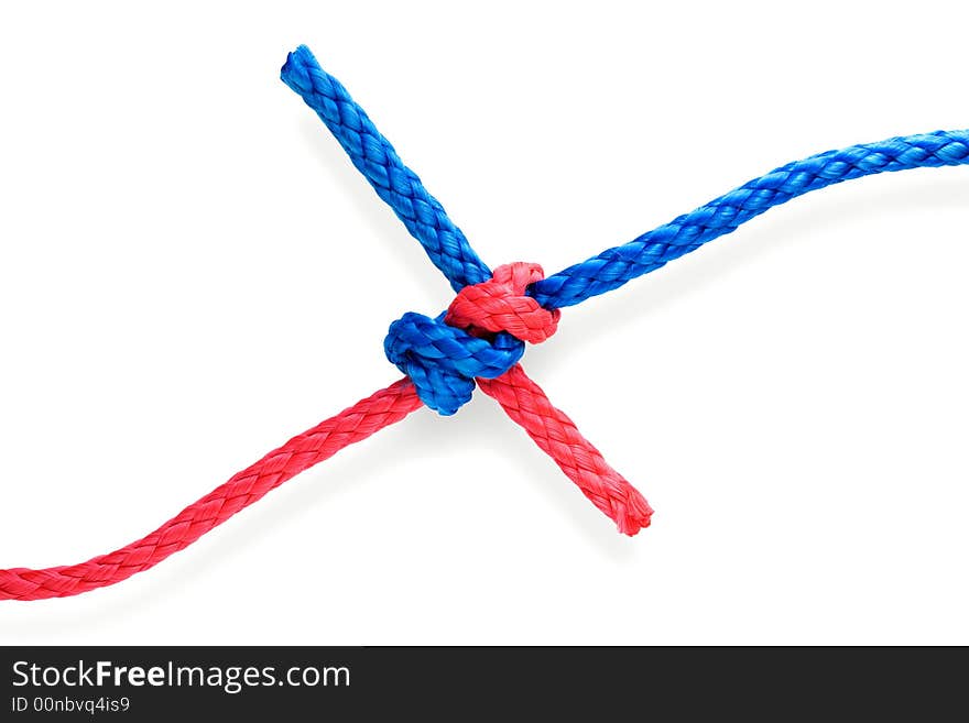 Fisher's dagger knot with red and blue ropes. Isolated on white. Tight. Fisher's dagger knot with red and blue ropes. Isolated on white. Tight.