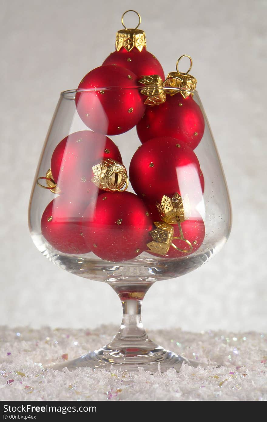 Glass with spheres on a white background. Glass with spheres on a white background