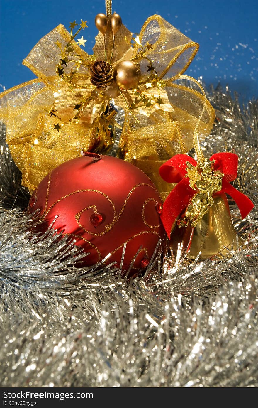 Beautiful sparkly christmas postcard with red globes and golden ribbon. Beautiful sparkly christmas postcard with red globes and golden ribbon