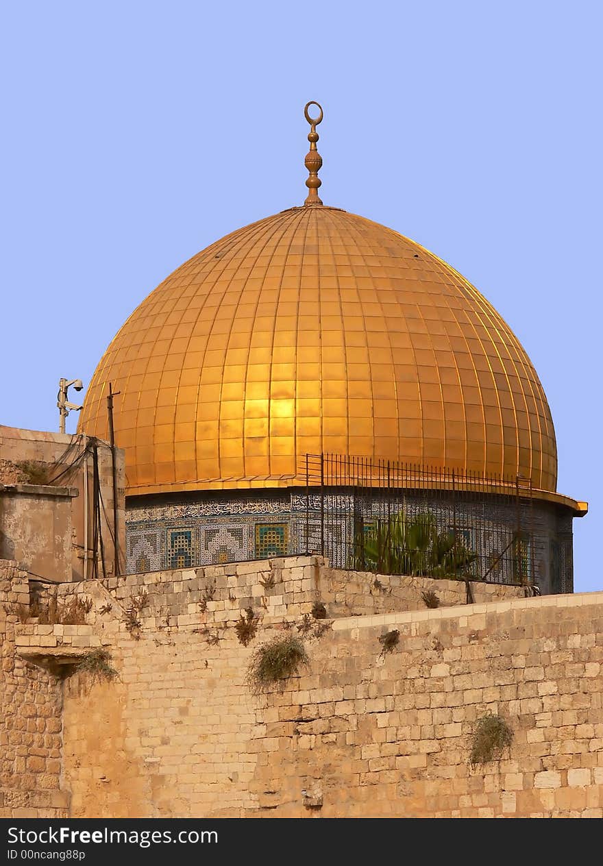 The golden Dom on the temple ground in Jerusalem, in foreground the wailing, western wall. The golden Dom on the temple ground in Jerusalem, in foreground the wailing, western wall.