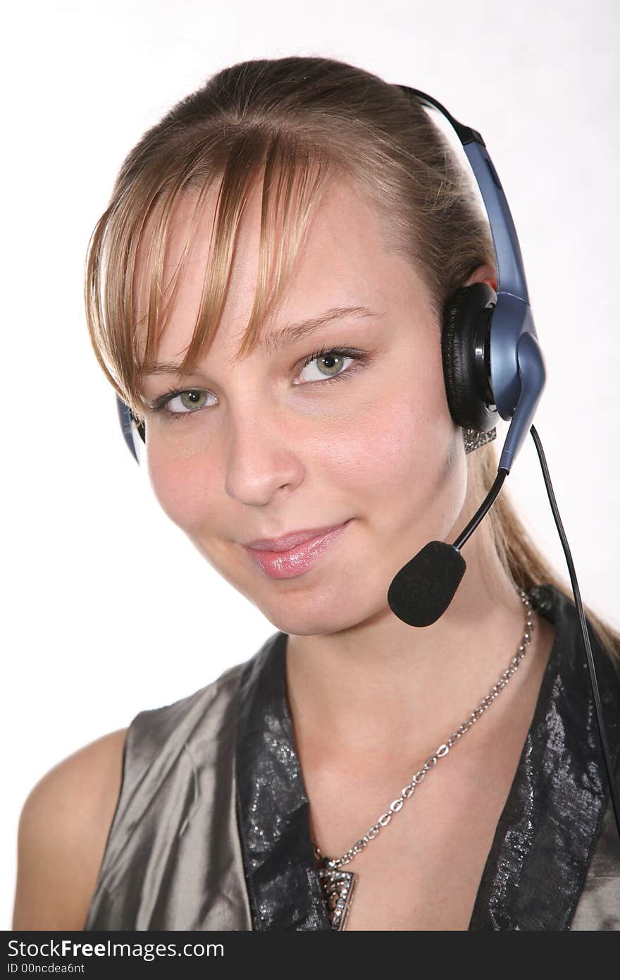 Young woman in headset on a white