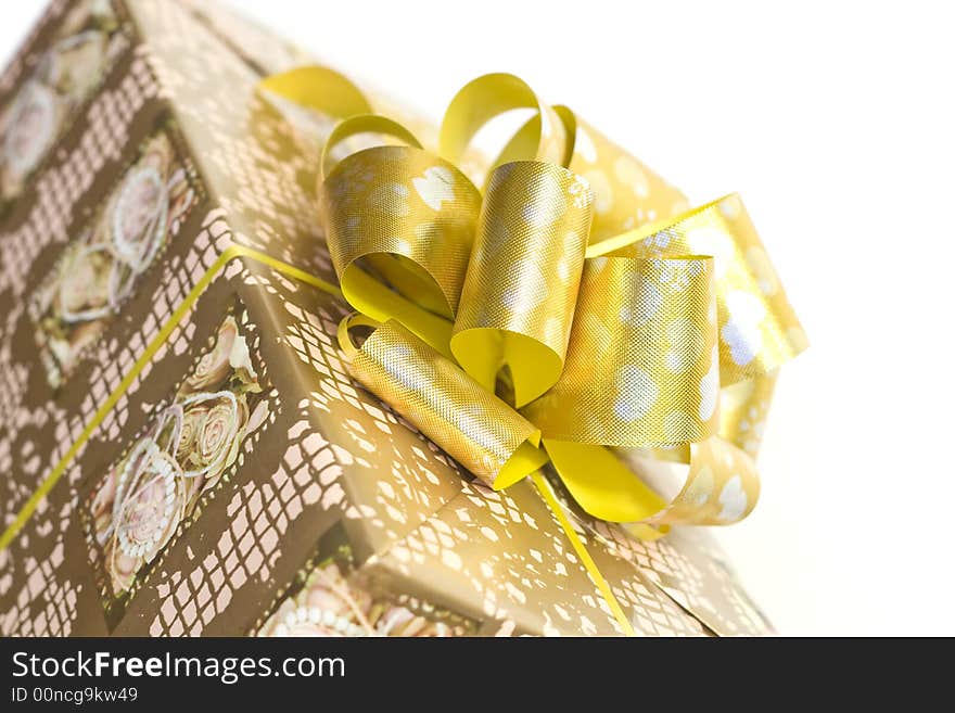 Detail Of A Gift Box With Golden Ribbon And Bow