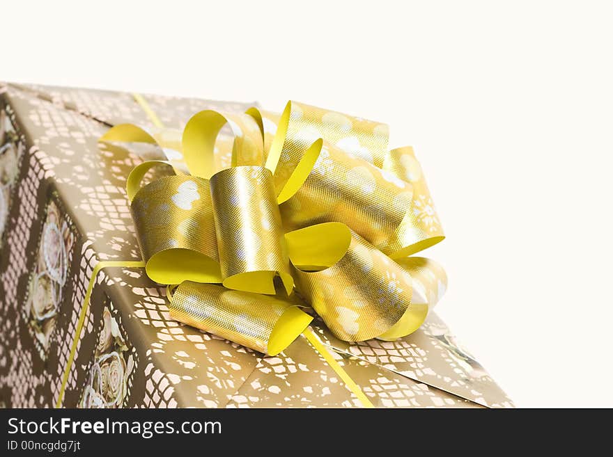 Detail Of A Gift Box With Golden Ribbon And Bow