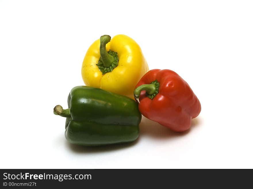 Three peppers on the white background