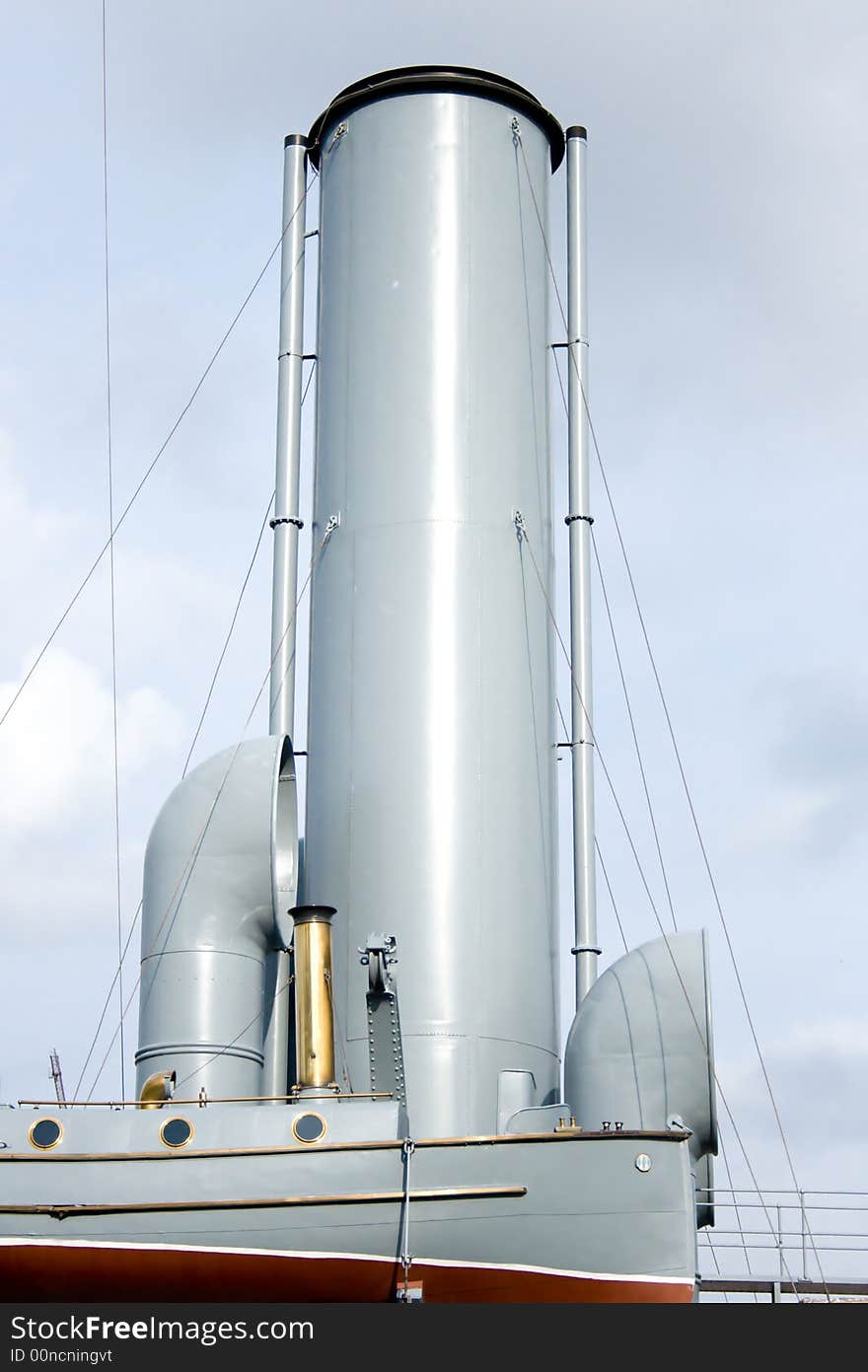 Ship tubes and boat close up with a sky in a background. Ship tubes and boat close up with a sky in a background