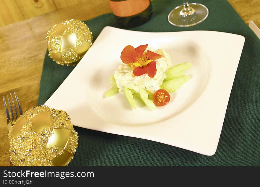 Apple salad with christmas decoration and eatible flower. Apple salad with christmas decoration and eatible flower