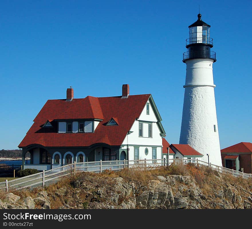 Lighthouse overlooking Atlantic Ocean near Portland, Maine. Lighthouse overlooking Atlantic Ocean near Portland, Maine