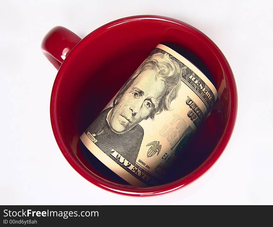 US 20 Dollars Bills in a Mug