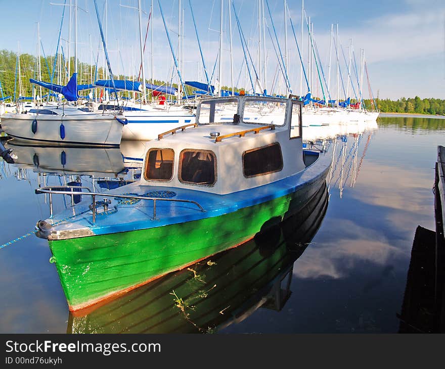 Green ship moored in Mikolajki port in Poland. Green ship moored in Mikolajki port in Poland