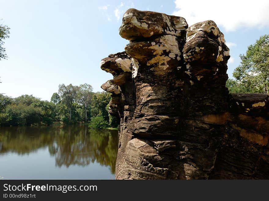 Naga at the entrance of Bakong, Angkor, Cambodia. Naga at the entrance of Bakong, Angkor, Cambodia