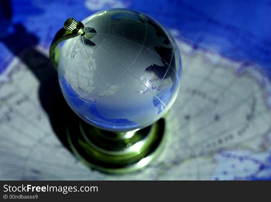 Globe on a background of a card