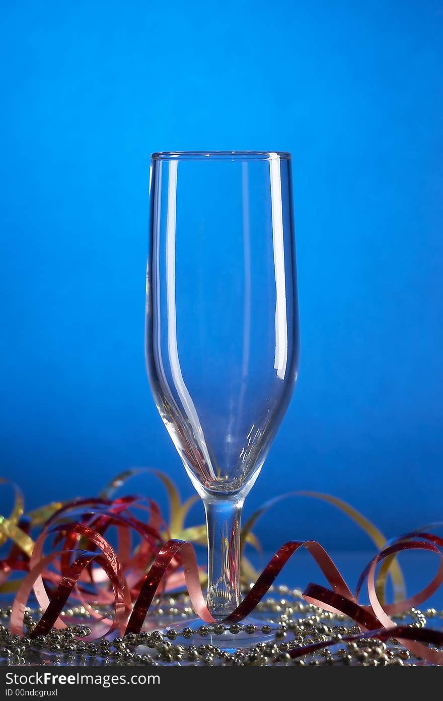 Still life with glass on the blue background