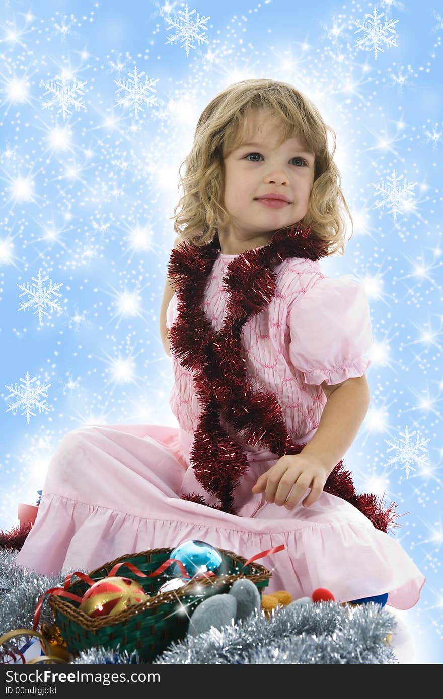 Beautiful little girl with christmas decoration on isolated background